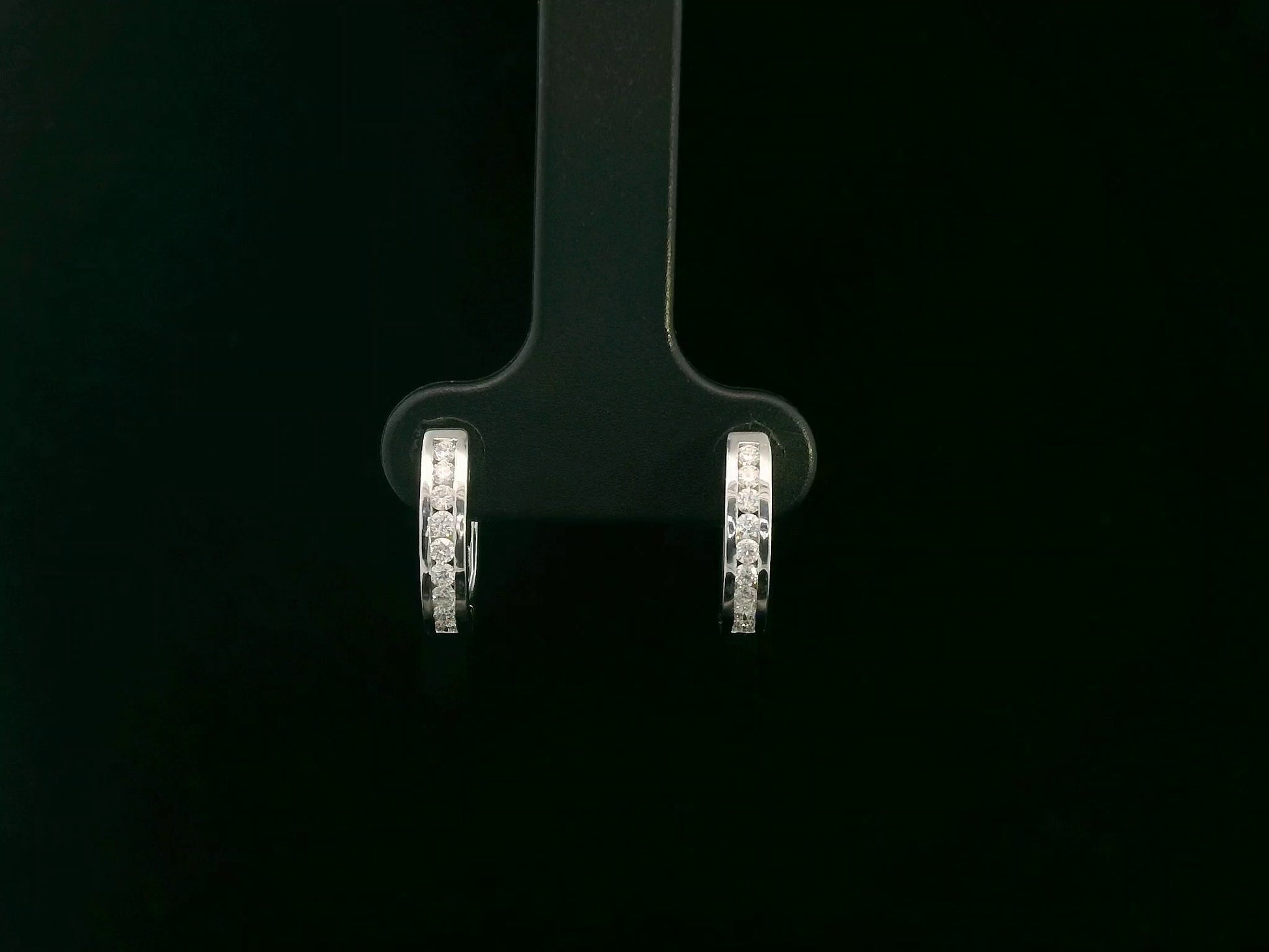 18K white gold channel-set diamond huggie earrings with round brilliant diamonds – Emirates Diamonds
