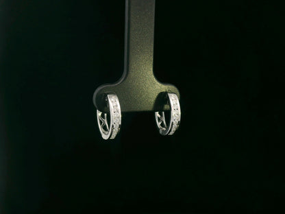 18K white gold channel-set diamond huggie earrings with round brilliant diamonds – Emirates Diamonds