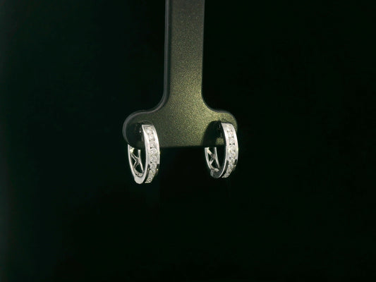 18K white gold channel-set diamond huggie earrings with round brilliant diamonds – Emirates Diamonds