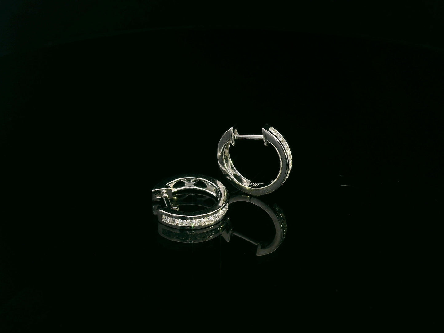 18K white gold channel-set diamond huggie earrings with round brilliant diamonds – Emirates Diamonds