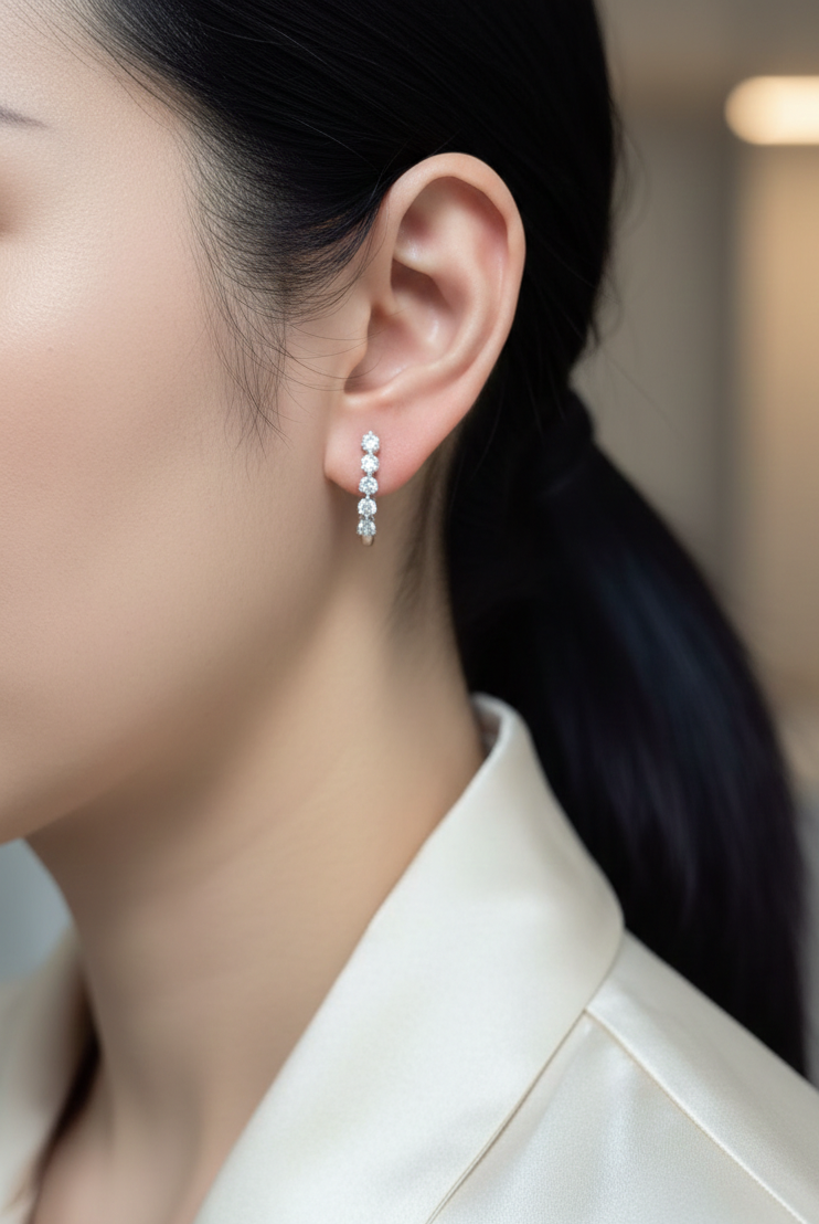 18K white gold diamond hoop earrings with round brilliant cut diamonds totaling 1.43 carats – Emirates Diamonds.