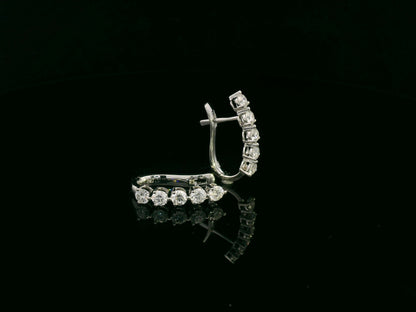 18K white gold diamond hoop earrings with round brilliant cut diamonds totaling 1.43 carats – Emirates Diamonds.