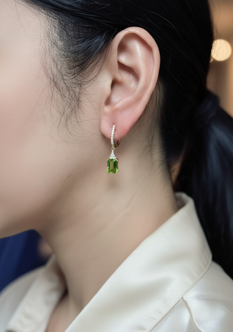 18K yellow gold emerald cut peridot diamond drop earrings by Emirates Diamonds