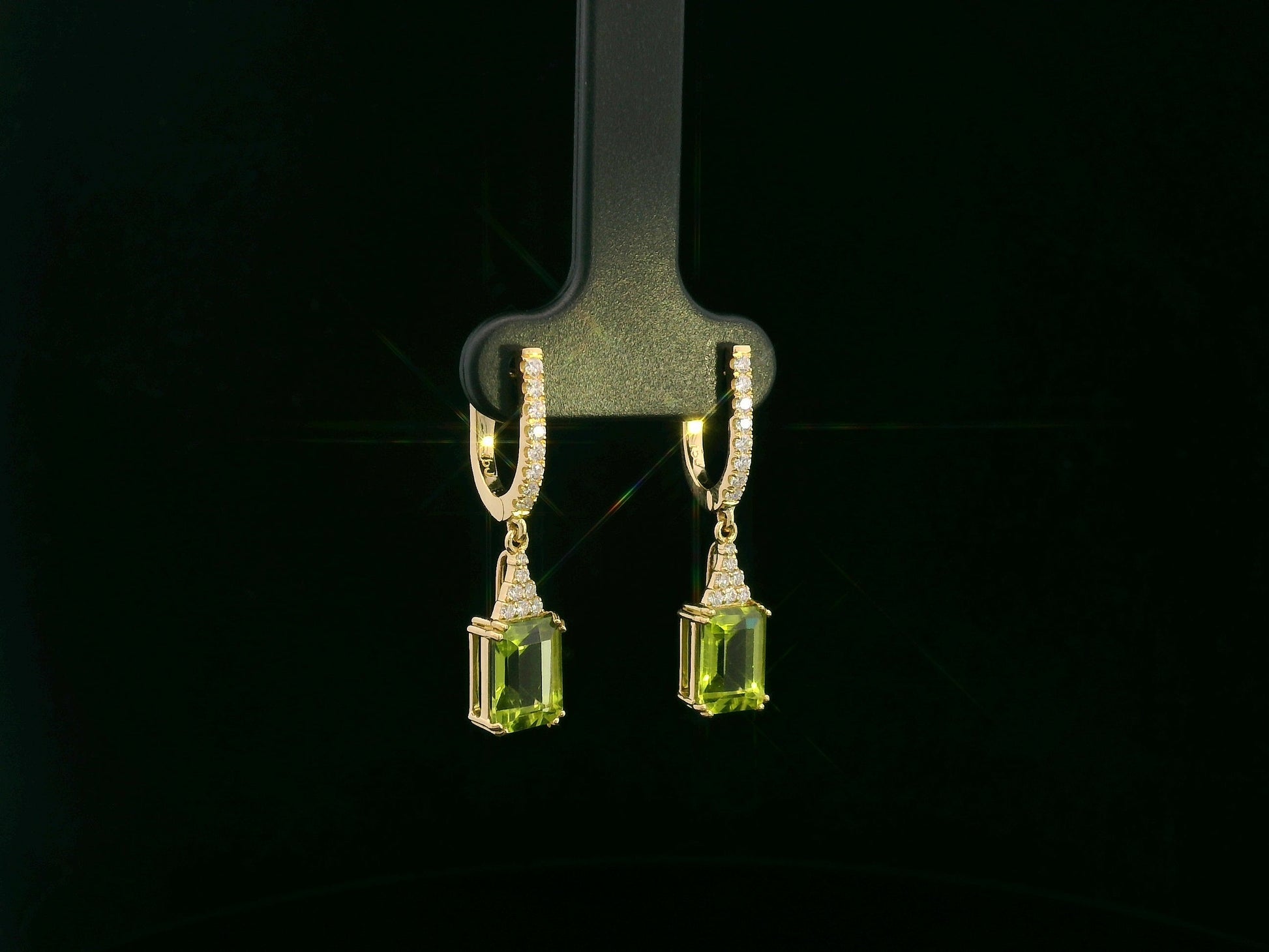 18K yellow gold emerald cut peridot diamond drop earrings by Emirates Diamonds