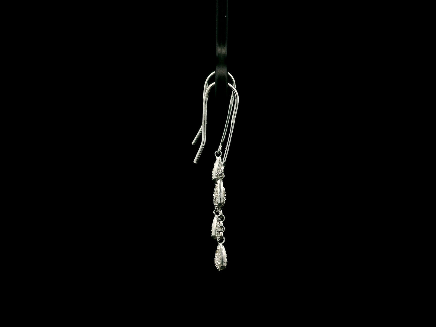 Pear-shaped diamond drop earrings in 18K white gold with 0.14 carat natural diamonds by Emirates Diamonds.