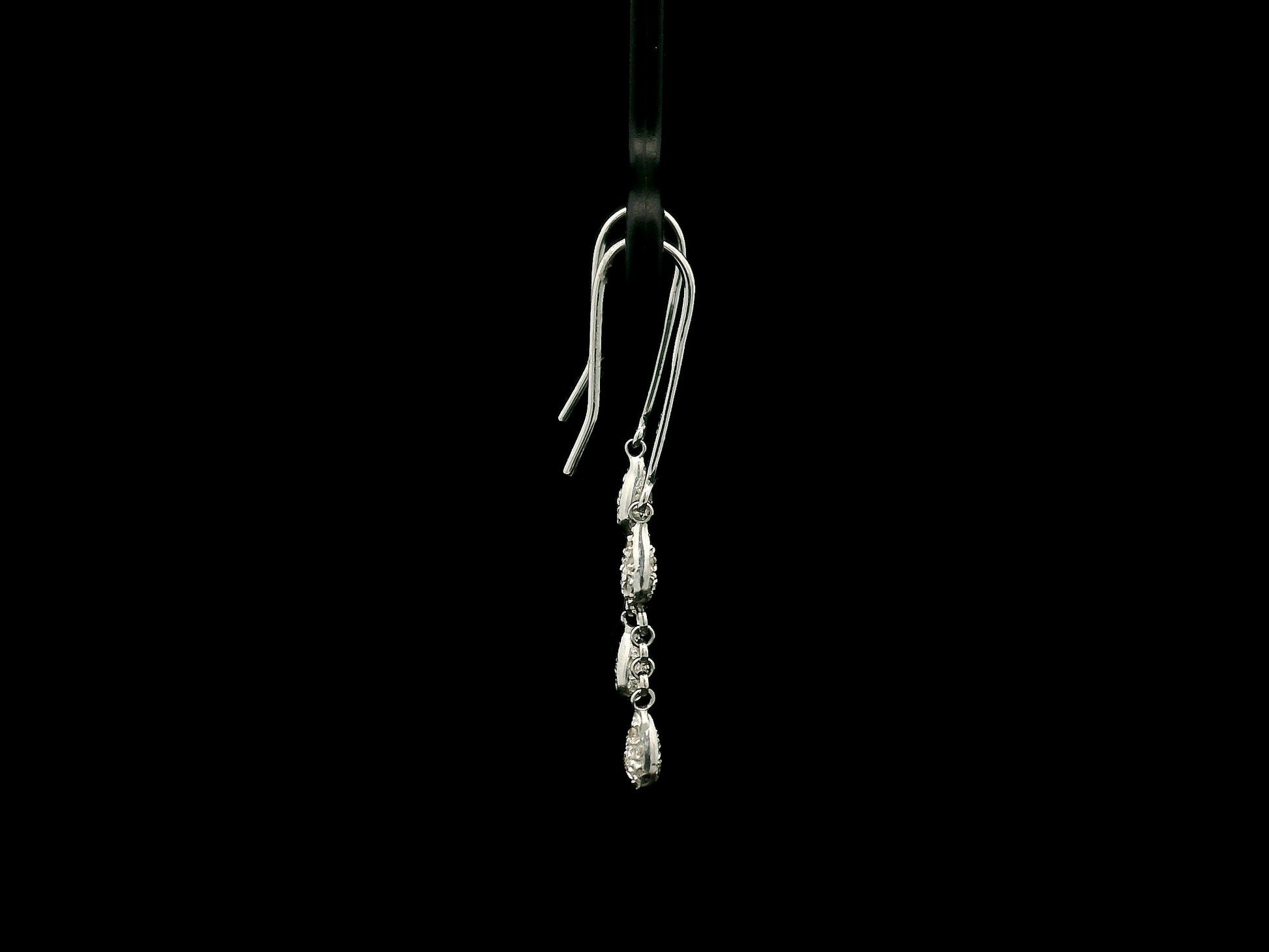 Pear-shaped diamond drop earrings in 18K white gold with 0.14 carat natural diamonds by Emirates Diamonds.