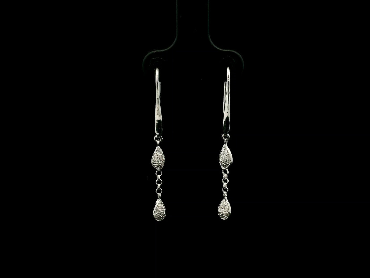 Pear-shaped diamond drop earrings in 18K white gold with 0.14 carat natural diamonds by Emirates Diamonds.