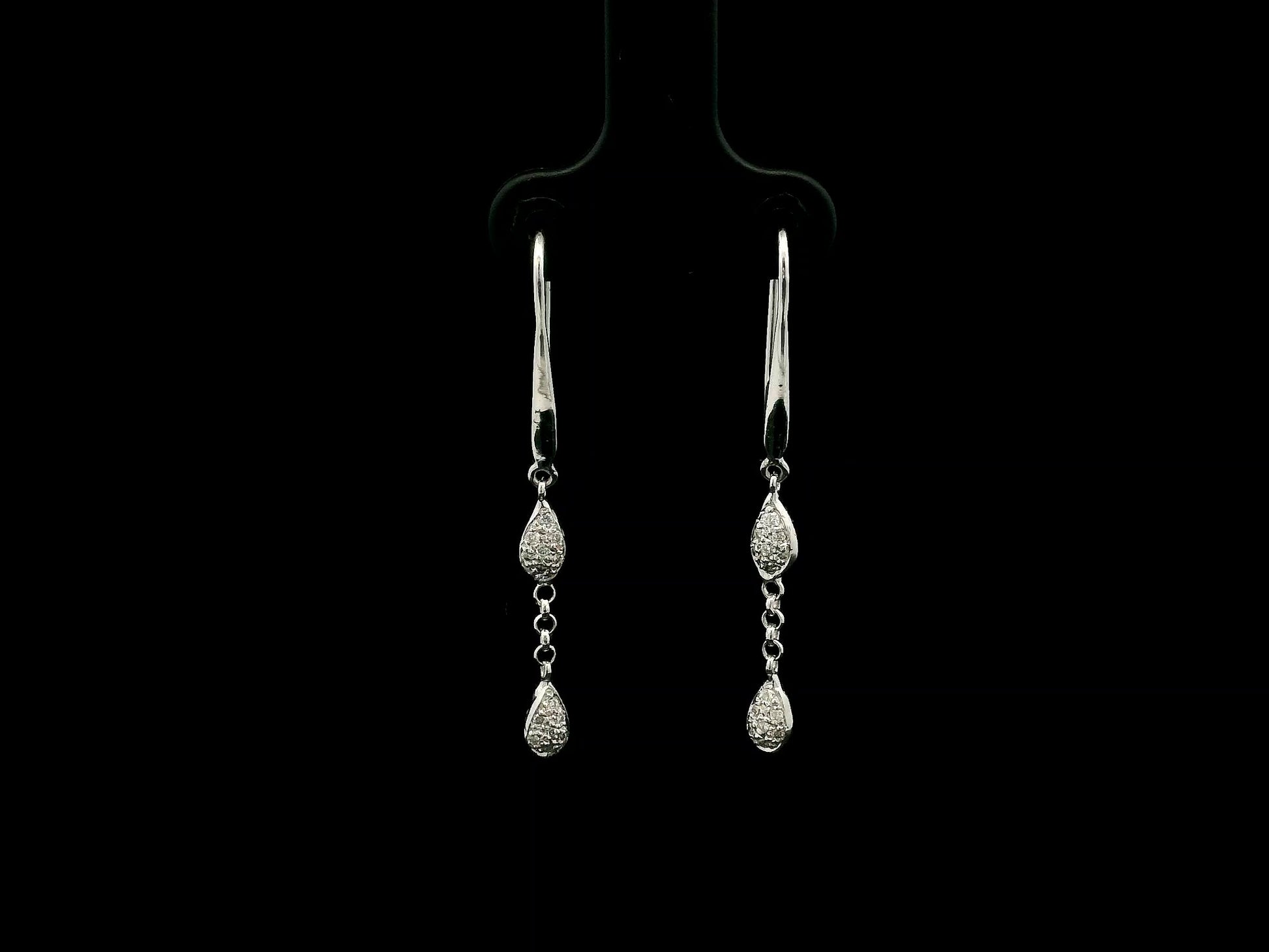 Pear-shaped diamond drop earrings in 18K white gold with 0.14 carat natural diamonds by Emirates Diamonds.