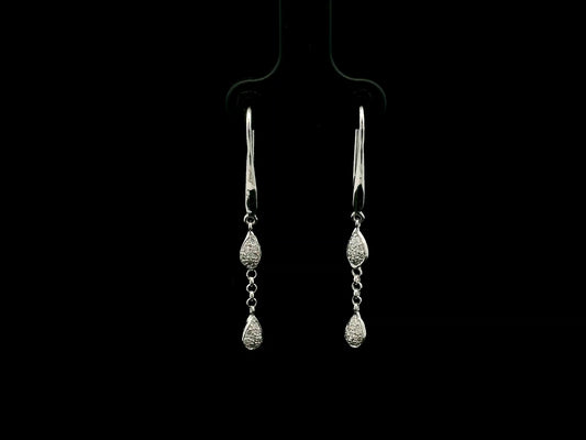 Pear-shaped diamond drop earrings in 18K white gold with 0.14 carat natural diamonds by Emirates Diamonds.