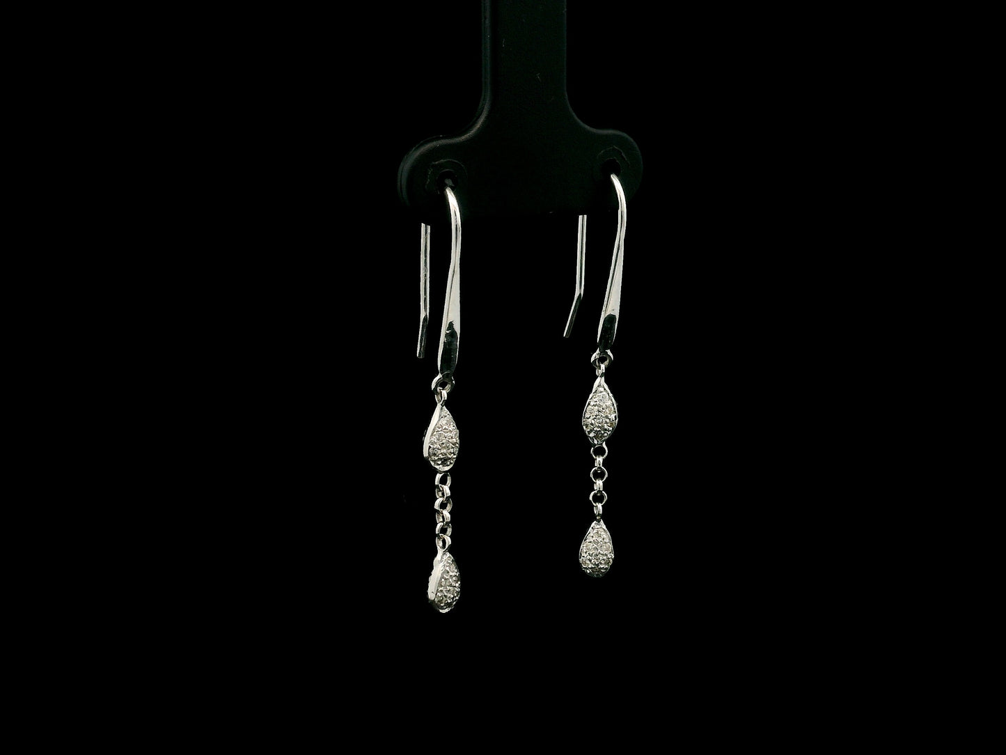 Pear-shaped diamond drop earrings in 18K white gold with 0.14 carat natural diamonds by Emirates Diamonds.