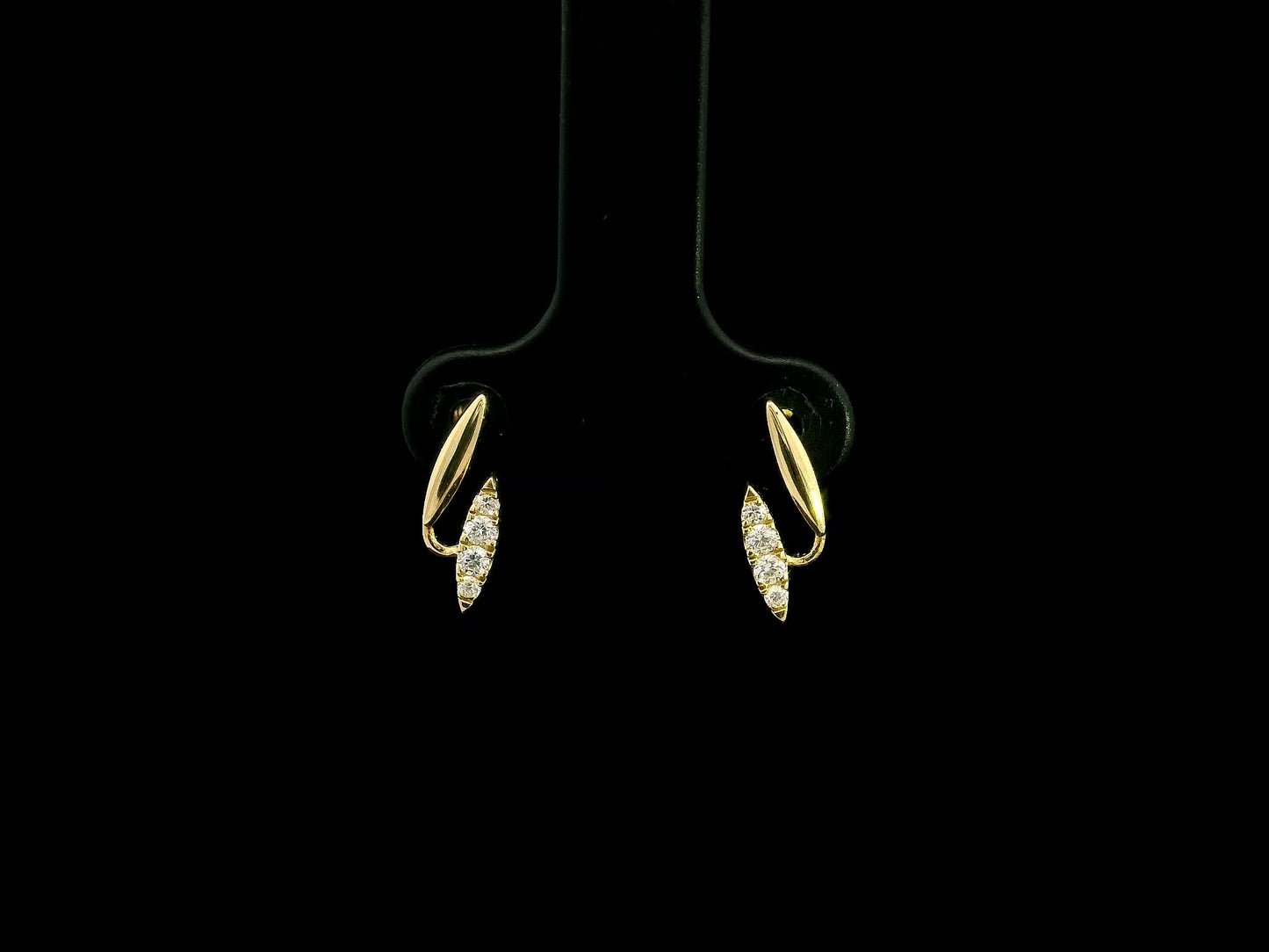 0.12 carat diamond curve stud earrings in 18K yellow gold by Emirates Diamonds
