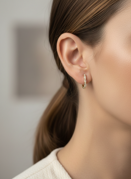 Baguette and round diamond hoop earrings in 18K yellow gold with 0.34 carat natural diamonds by Emirates Diamonds.