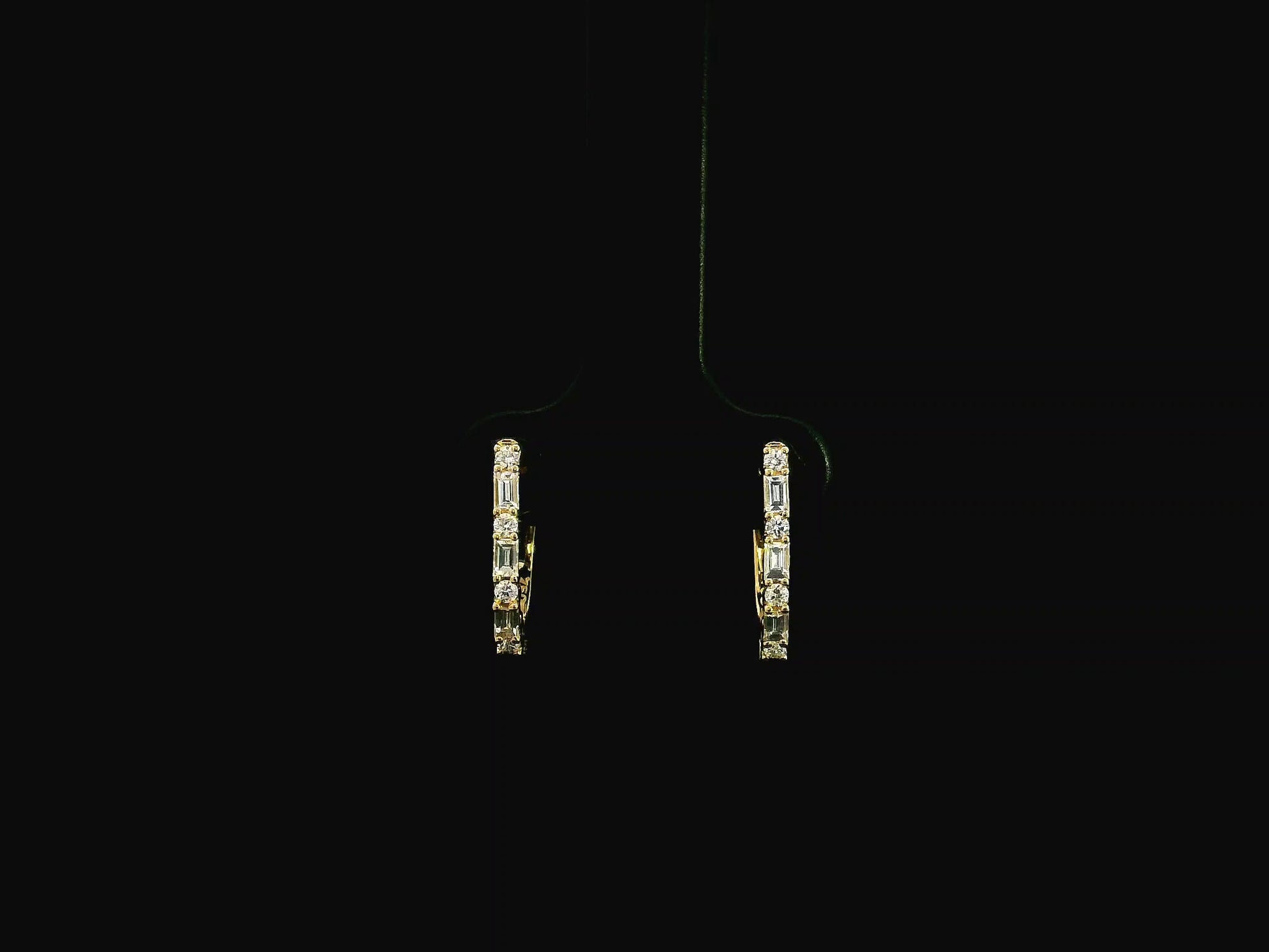 Baguette and round diamond hoop earrings in 18K yellow gold with 0.34 carat natural diamonds by Emirates Diamonds.