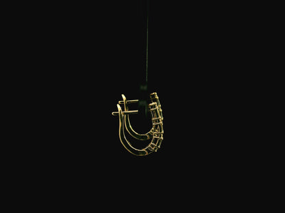 Baguette and round diamond hoop earrings in 18K yellow gold with 0.34 carat natural diamonds by Emirates Diamonds.