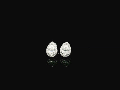 Pear cut diamond halo stud earrings in 18K white gold with GIA certified D color VS2 diamonds – Emirates Diamonds