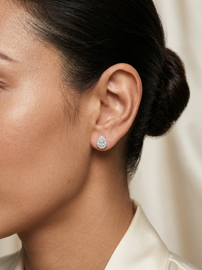 Pear cut diamond halo stud earrings in 18K white gold with GIA certified D color VS2 diamonds – Emirates Diamonds