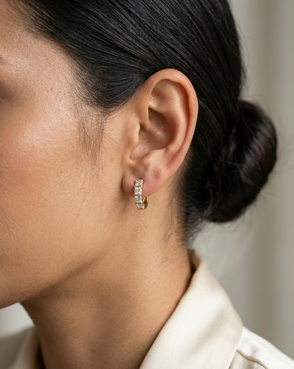 Diamond hoop earrings with 0.45ct natural diamonds set in 18K yellow gold by Emirates Diamonds