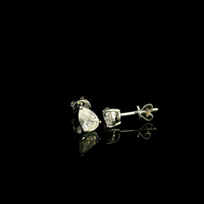 GIA certified pear shape diamond stud earrings in 18K white gold with two 0.50 carat D colour VS1 natural diamonds