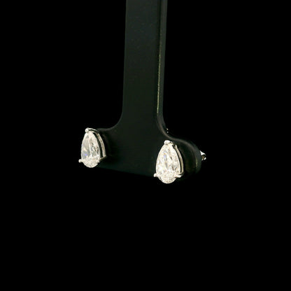 GIA certified pear shape diamond stud earrings in 18K white gold with two 0.50 carat D colour VS1 natural diamonds