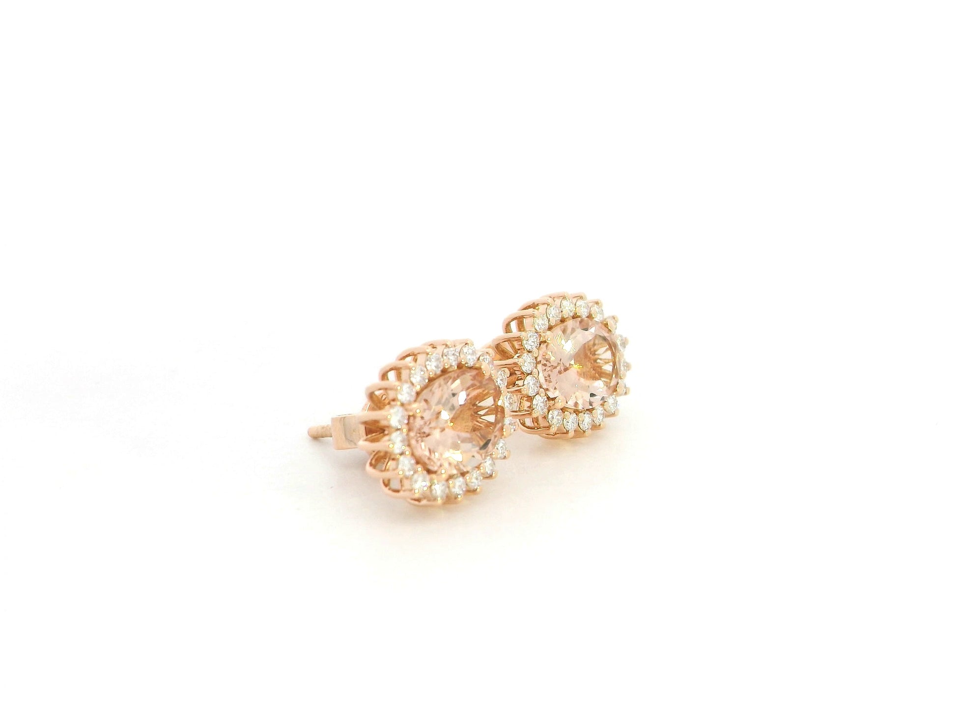 2.28 carat oval morganite and 0.36 carat diamond halo stud earrings in 18K rose gold by Emirates Diamonds