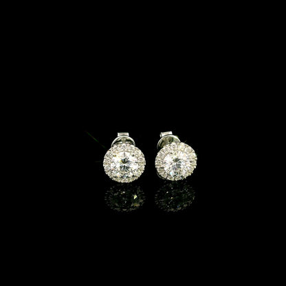 GIA certified round diamond halo stud earrings in 18K white gold with D colour natural centre diamonds