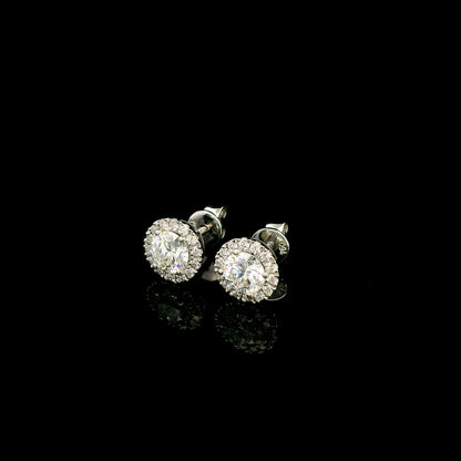 GIA certified round diamond halo stud earrings in 18K white gold with D colour natural centre diamonds