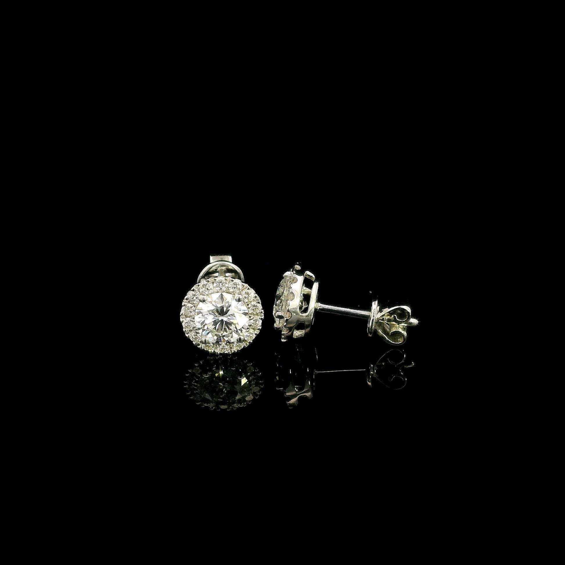 GIA certified round diamond halo stud earrings in 18K white gold with D colour natural centre diamonds