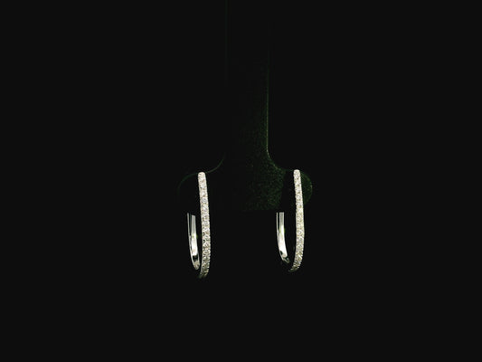 Pavé diamond hoop earrings in 18K white gold with 0.21 carat natural diamonds by Emirates Diamonds.