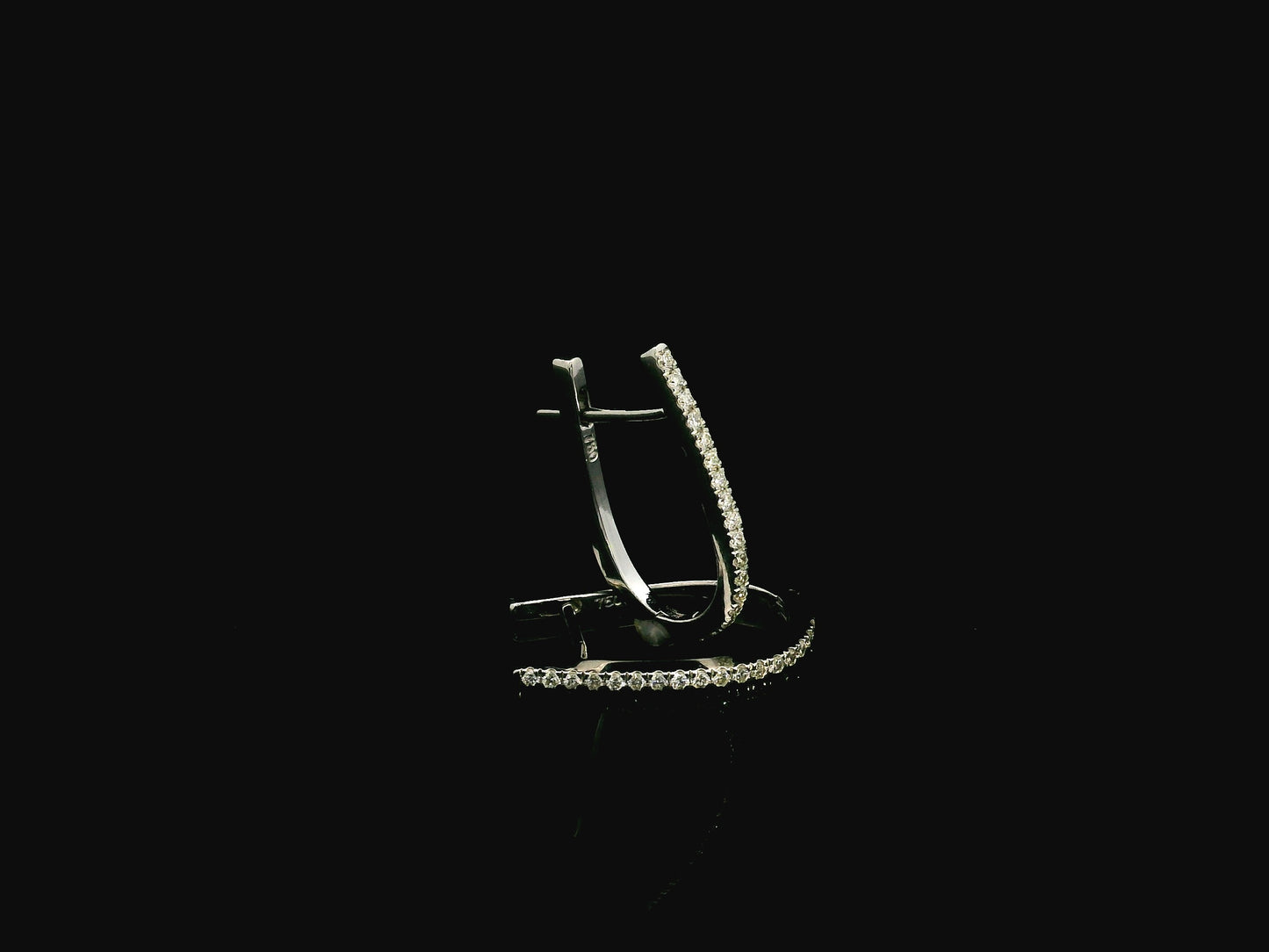 Pavé diamond hoop earrings in 18K white gold with 0.21 carat natural diamonds by Emirates Diamonds.