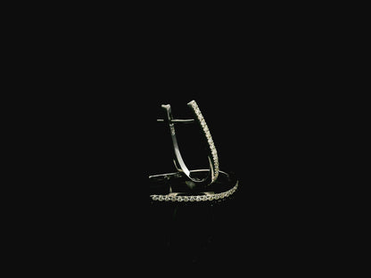 Pavé diamond hoop earrings in 18K white gold with 0.21 carat natural diamonds by Emirates Diamonds.
