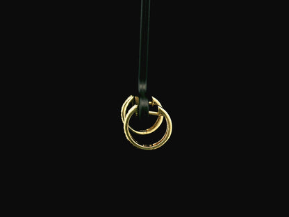 Small diamond huggie hoop earrings in 18K yellow gold by Emirates Diamonds
