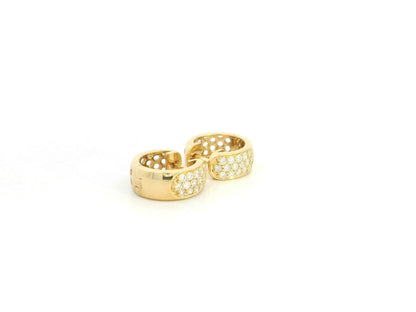 Diamond huggie hoop earrings in 18K yellow gold by Emirates Diamonds