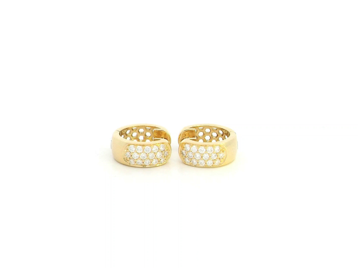 Diamond huggie hoop earrings in 18K yellow gold by Emirates Diamonds