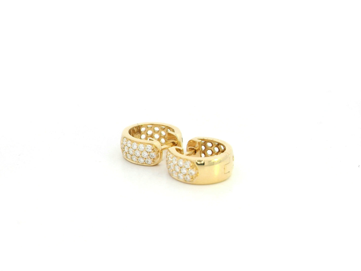 Diamond huggie hoop earrings in 18K yellow gold by Emirates Diamonds