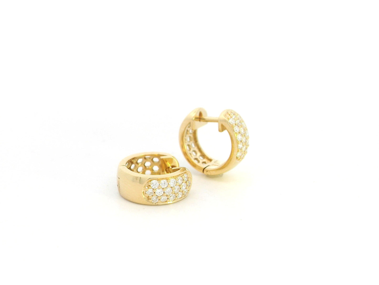 Diamond huggie hoop earrings in 18K yellow gold by Emirates Diamonds