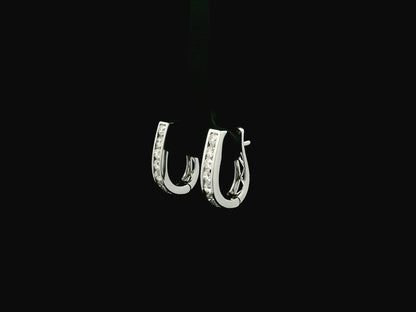 Diamond hoop earrings in 18K white gold featuring 0.98 carats of diamonds by Emirates Diamonds.