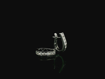 Diamond hoop earrings in 18K white gold featuring 0.98 carats of diamonds by Emirates Diamonds.
