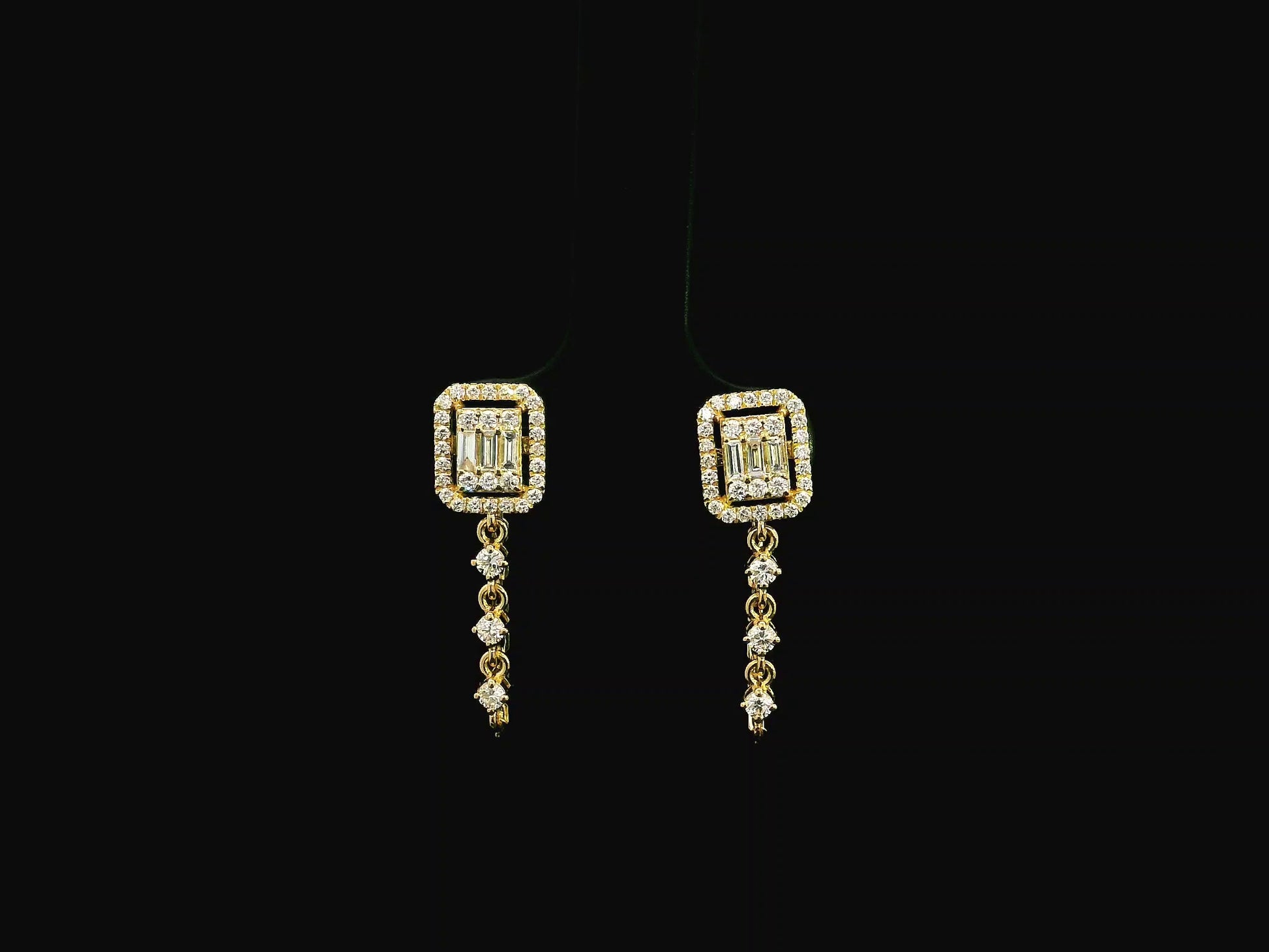 Diamond ear jacket earrings with chain detail 0.54ct in 18K yellow gold by Emirates Diamonds
