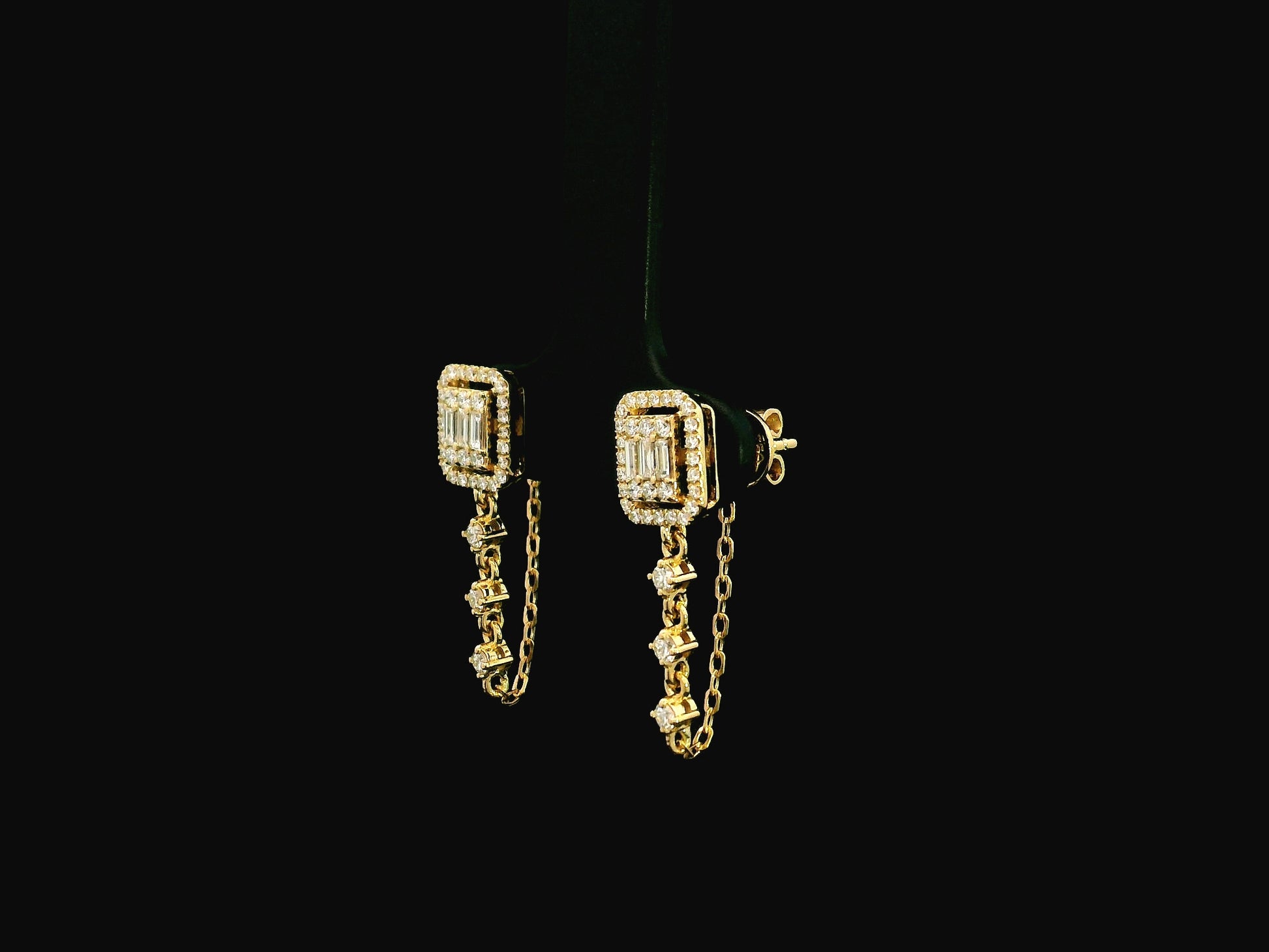Diamond ear jacket earrings with chain detail 0.54ct in 18K yellow gold by Emirates Diamonds