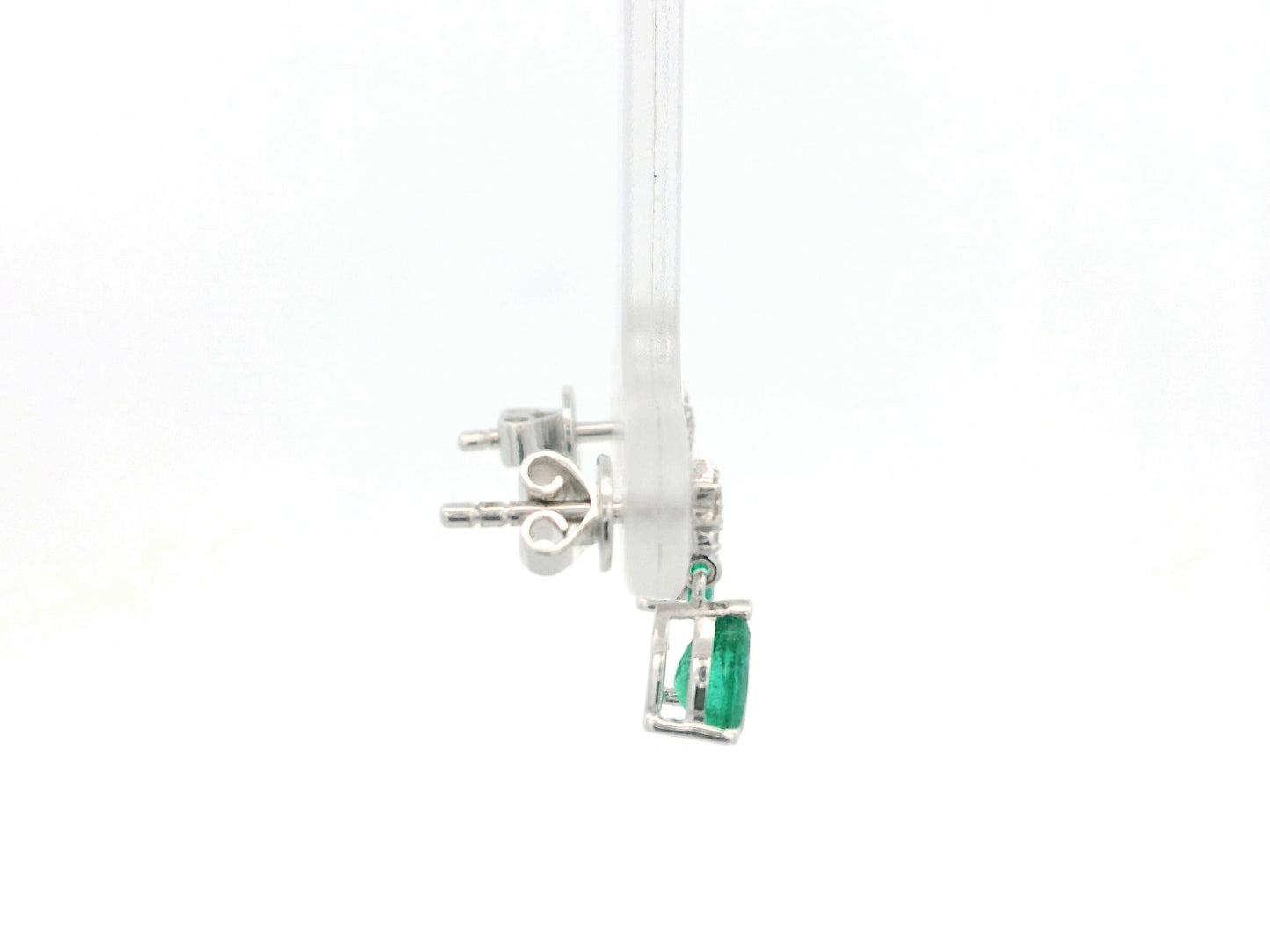 Pear-shaped emerald and diamond drop earrings in 18K yellow gold featuring 0.76 carat emeralds and 0.06 carat diamonds by Emirates Diamonds.