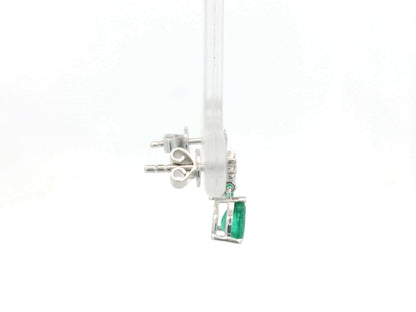 Pear-shaped emerald and diamond drop earrings in 18K yellow gold featuring 0.76 carat emeralds and 0.06 carat diamonds by Emirates Diamonds.