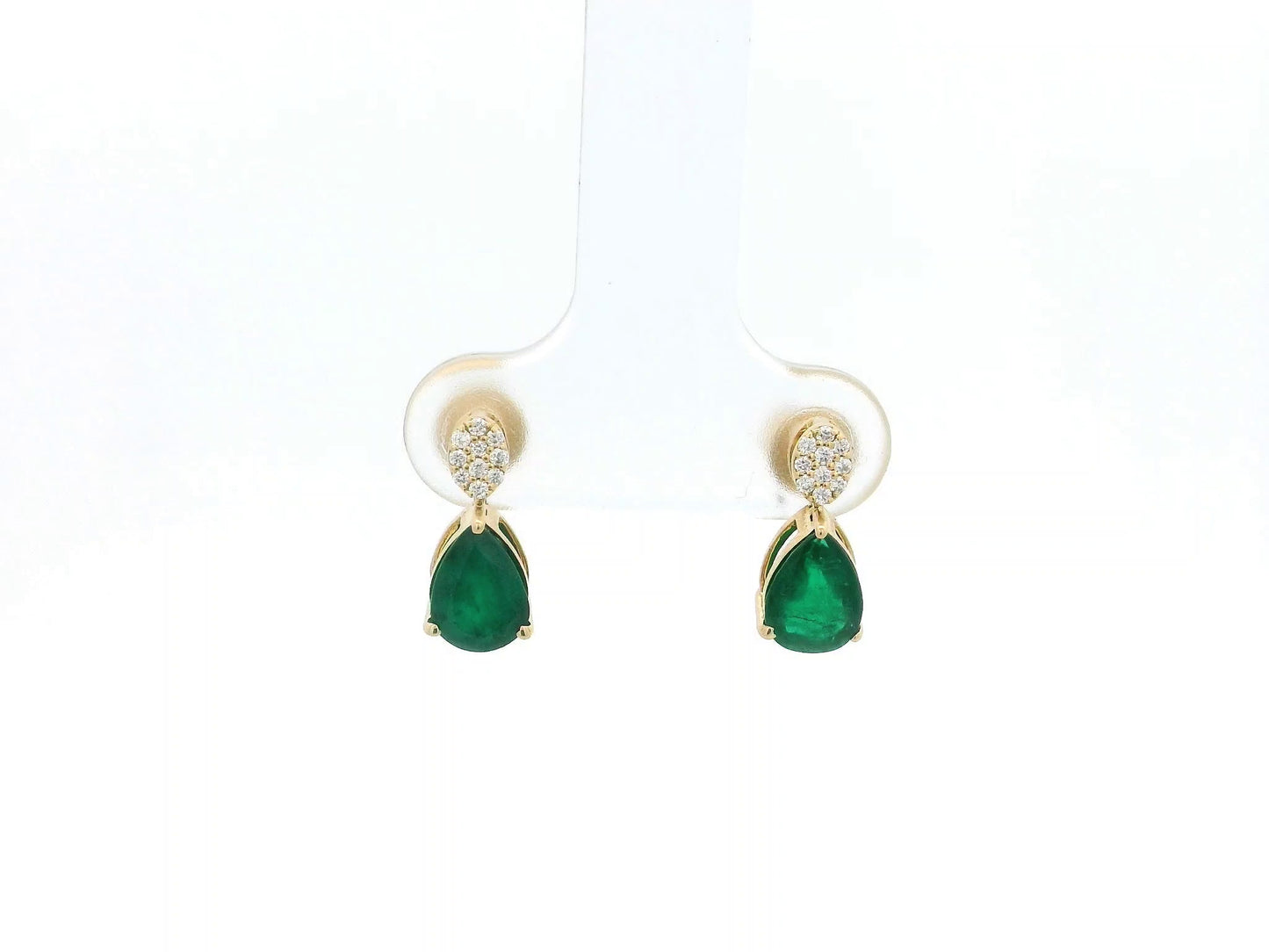 Pear emerald and diamond drop earrings in 18K yellow gold featuring 1.27 carat emeralds and 0.07 carat diamonds by Emirates Diamonds.