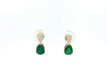Pear emerald and diamond drop earrings in 18K yellow gold featuring 1.27 carat emeralds and 0.07 carat diamonds by Emirates Diamonds.
