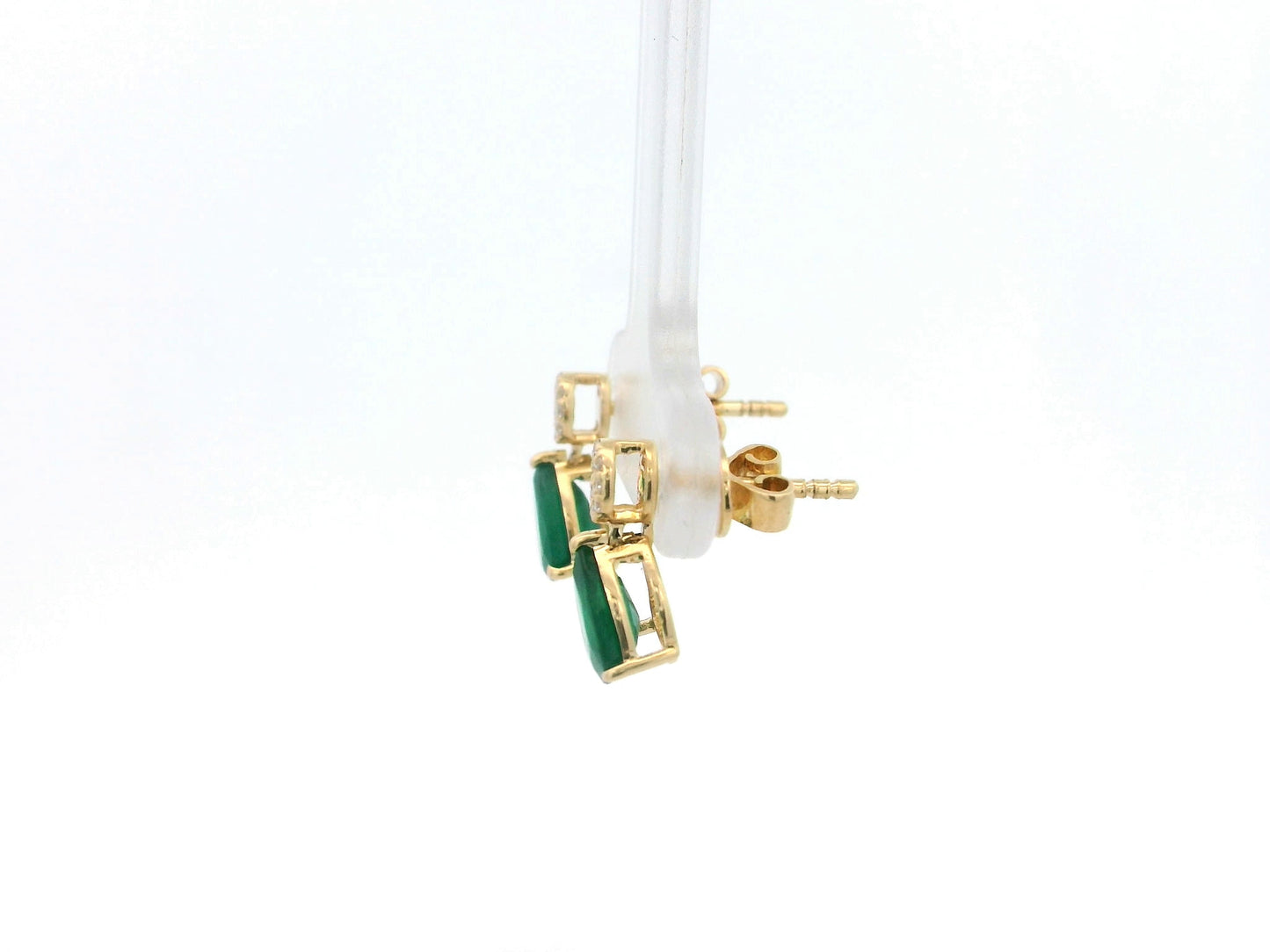 Pear emerald and diamond drop earrings in 18K yellow gold featuring 1.27 carat emeralds and 0.07 carat diamonds by Emirates Diamonds.