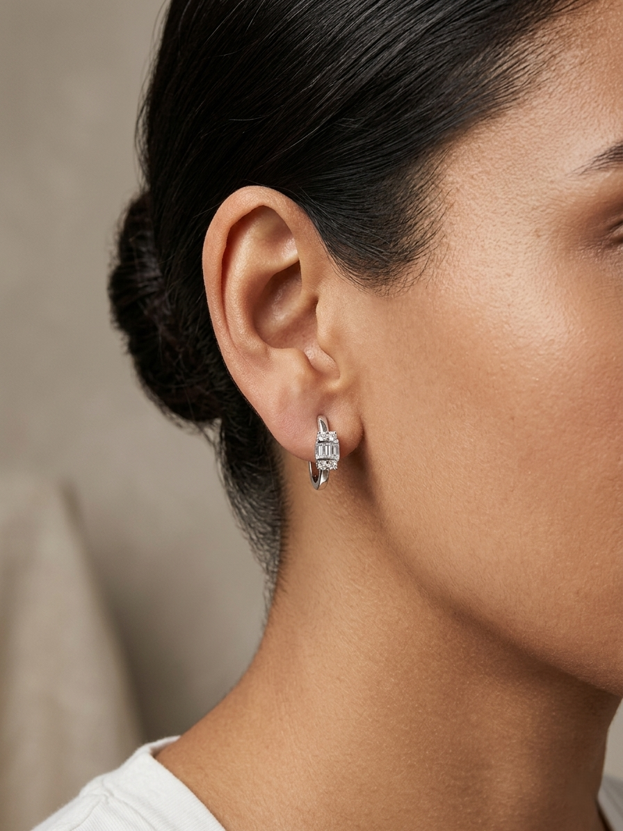 Baguette and round diamond hoop earrings in 18K white gold by Emirates Diamonds