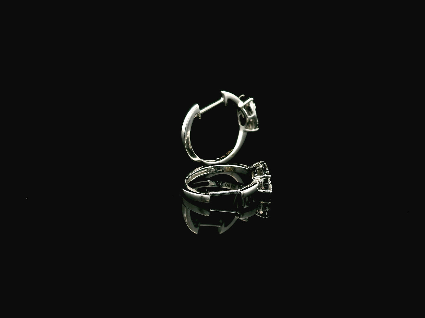 Baguette and round diamond hoop earrings in 18K white gold by Emirates Diamonds