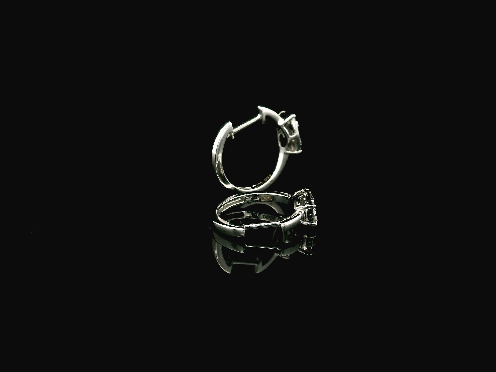 Baguette and round diamond hoop earrings in 18K white gold by Emirates Diamonds