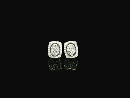 18K white gold diamond halo stud earrings featuring round brilliant diamonds with cushion halo design and 0.64 carat total diamond weight