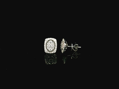 18K white gold diamond halo stud earrings featuring round brilliant diamonds with cushion halo design and 0.64 carat total diamond weight