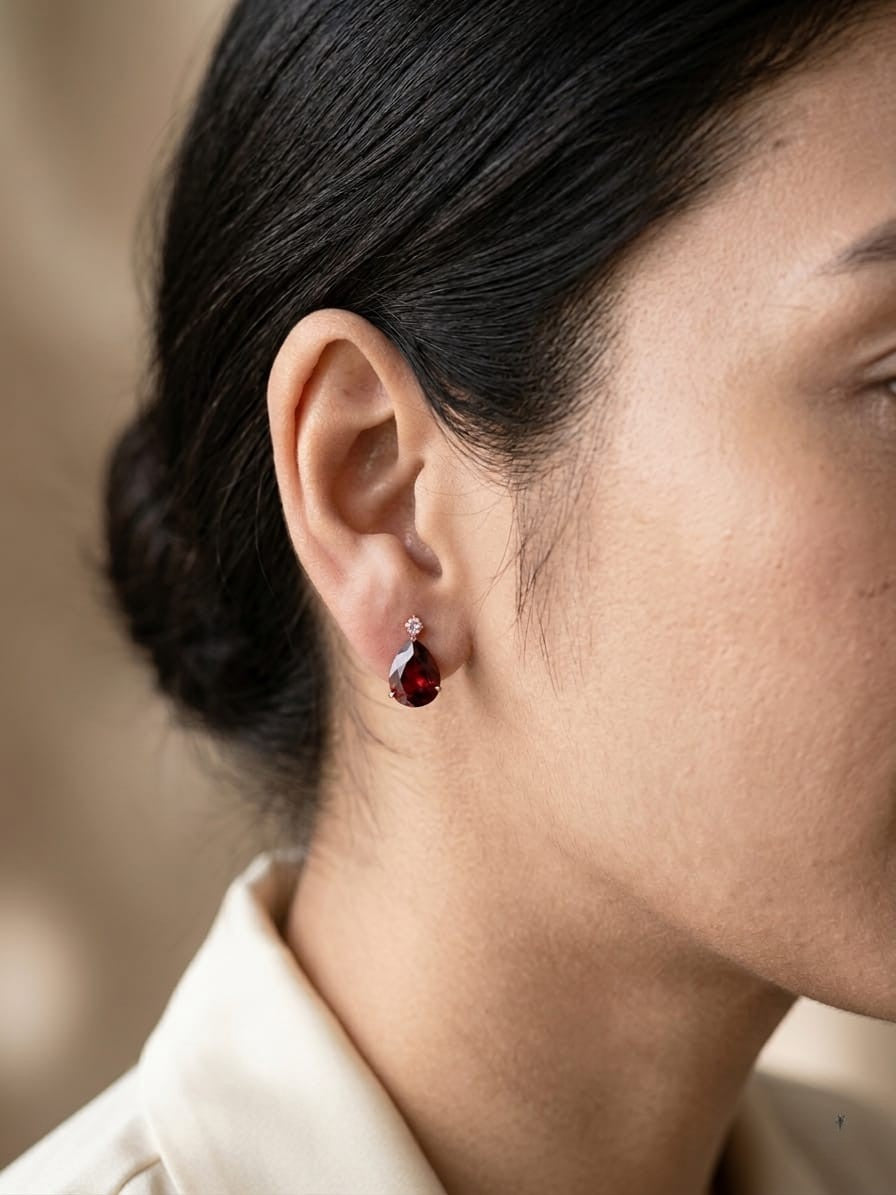 Garnet pear drop earrings with pink sapphire accents in 18K yellow gold Emirates Diamonds